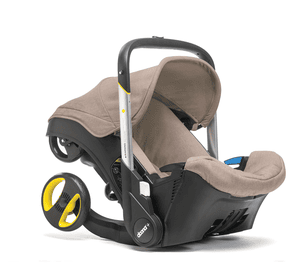 Babyschale  Plus beige (dune) mit voll integriertem Fahrgestell, 2 in 1