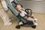 Buggy Minu V2 Gwen Green Mélange inkl Babywanne, cybex GOLD Babyschale Cloud Gi-Size Magic Black und Base G Black mit Zubehör
