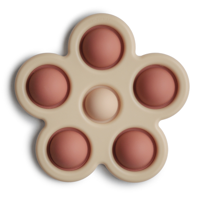 Levně mushie Push toy Flower Rose/ Blush /Shifting Sand