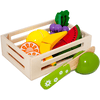 Tanner - Le petit commerçant - des fruits dans une boîte en bois