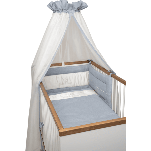 Elegantes Babybett mit blauer Bettwäsche