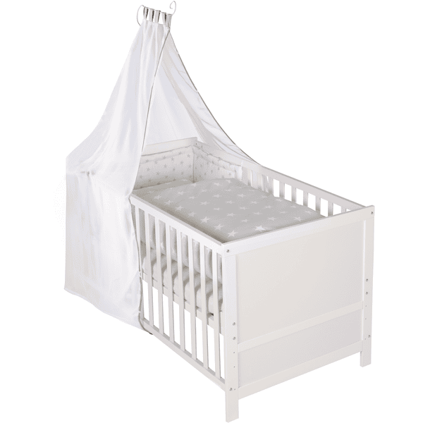 Weißes Babybett mit Himmelstange